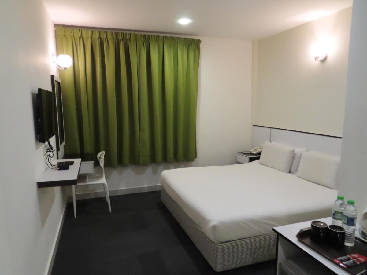 Akar Hotel Kampung Baru Куала-Лумпур Экстерьер фото
