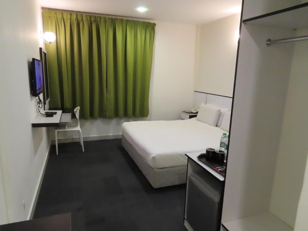 Akar Hotel Kampung Baru Куала-Лумпур Экстерьер фото
