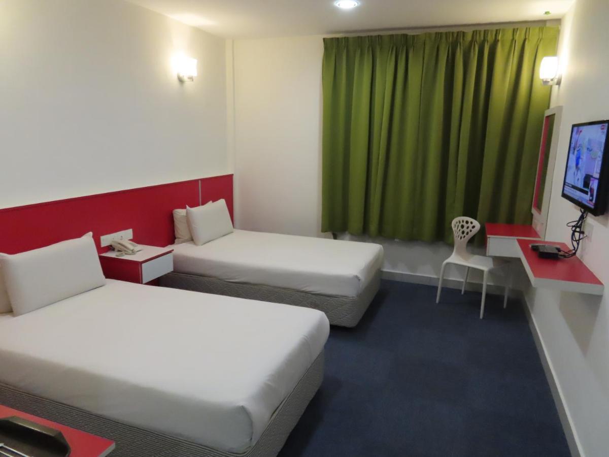 Akar Hotel Kampung Baru Куала-Лумпур Экстерьер фото